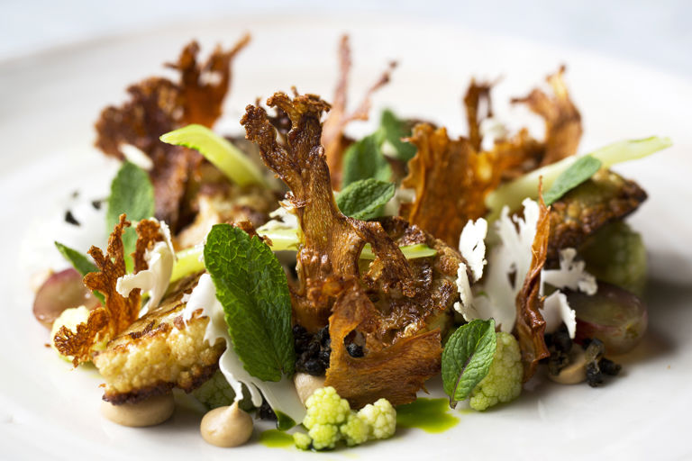 Yeasted cauliflower, raisins, capers and mint