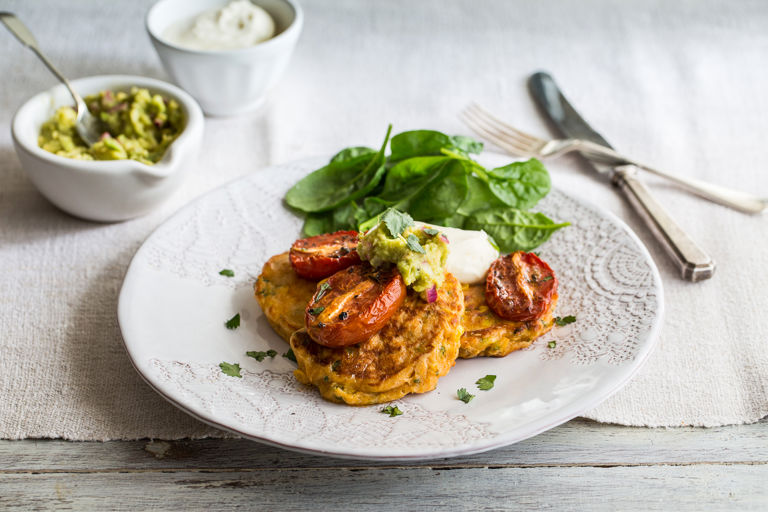 Sweetcorn fritters with slow roasted tomatoes and smashed avocado