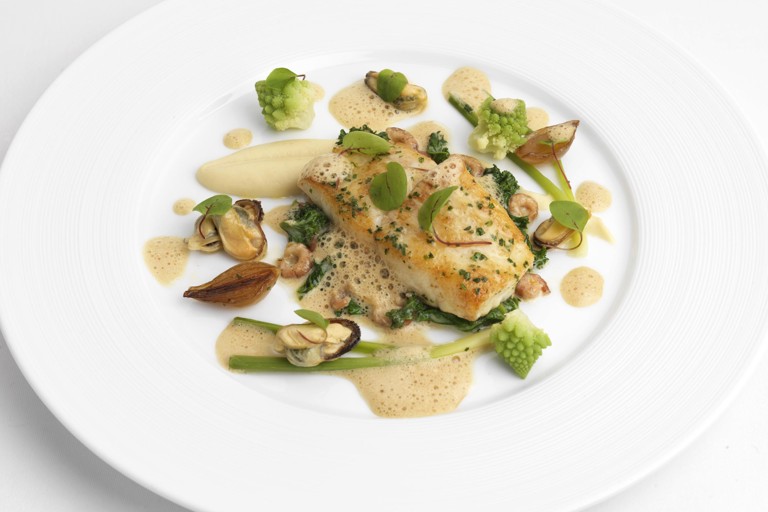 Seared turbot with celeriac, brown shrimp, mussels and shellfish velouté