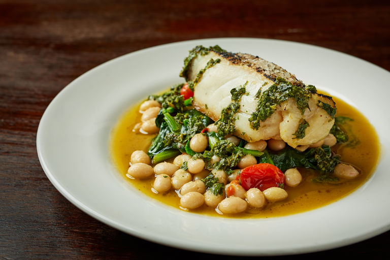 Hake with coco beans, spinach and green sauce