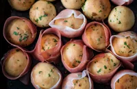 Garlic dough balls wrapped in prosciutto