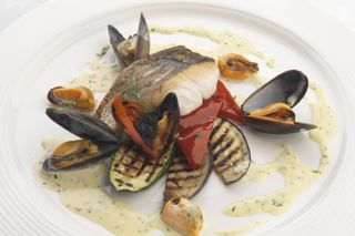 Fillet of hake with mussels and parsley cream sauce