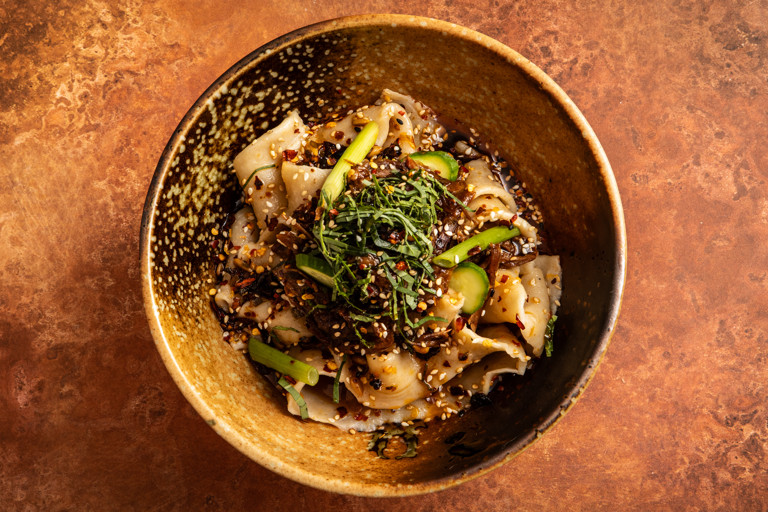 Sweet plum duck biang biang noodles with pickled spring onions