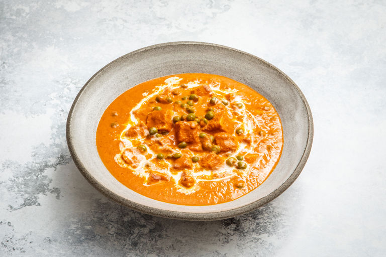 Peas and paneer butter masala with cardamom, star anise and cream