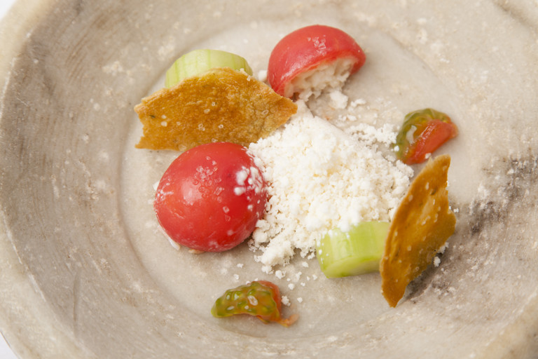 Compressed crab with tomato, horseradish granita and crab tuile 