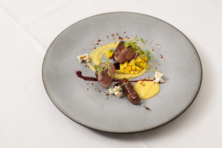 Anjou quail with bacon popcorn