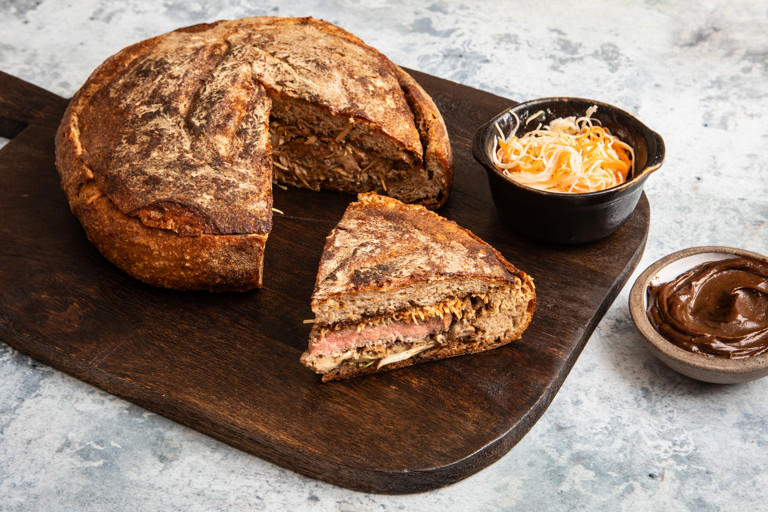 Shooter’s steak sandwich with black garlic aioli and pickled summer slaw