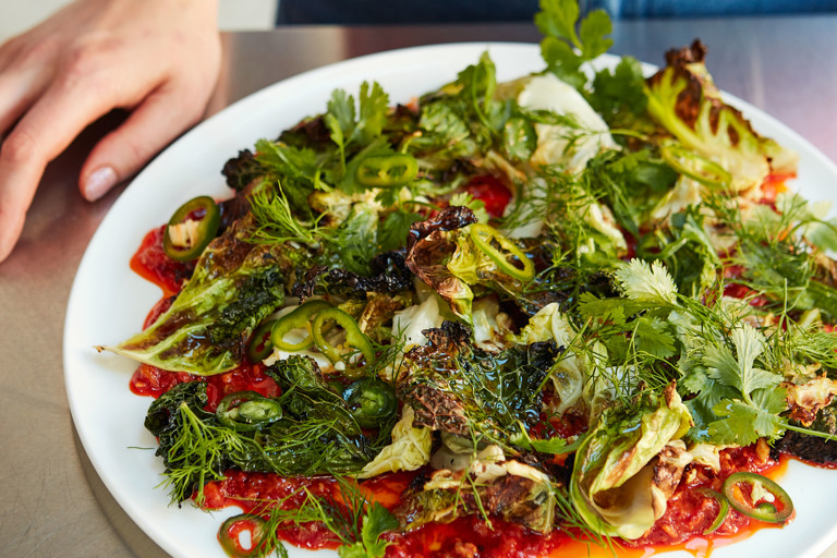 Roasted cabbage with mango and harissa sauce