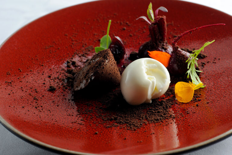 Chocolate parfait with beetroots, yoghurt ice cream, and chocolate soil