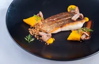 Seared sea bass with salt-baked heritage carrots