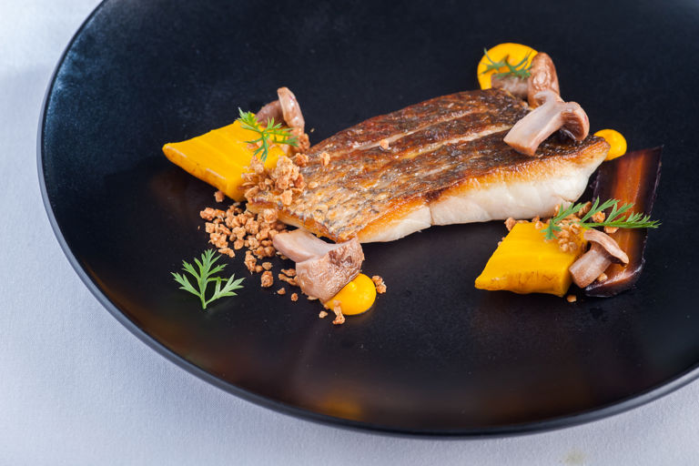Seared sea bass with salt-baked heritage carrots