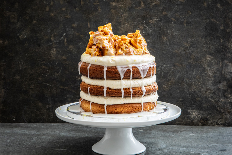 Triple layer lemon drizzle and thyme layer cake with lemon glaze and honeycomb 