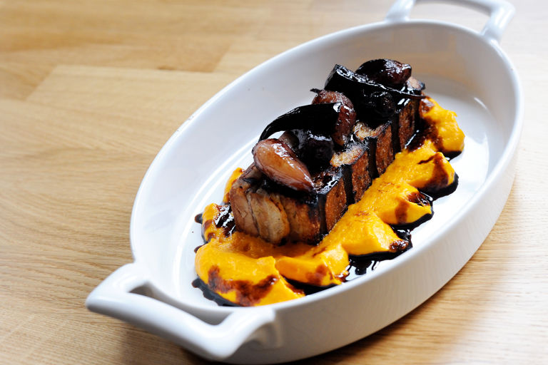 Roast pork belly with anise carrot purée and balsamic glazed carrots