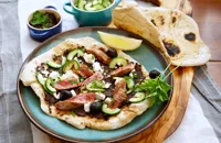 Lamb flatbreads with olive tapenade, feta and quick-pickled cucumber