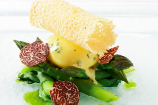 Asparagus spears with truffle, poached free-range duck egg and hollandaise sauce