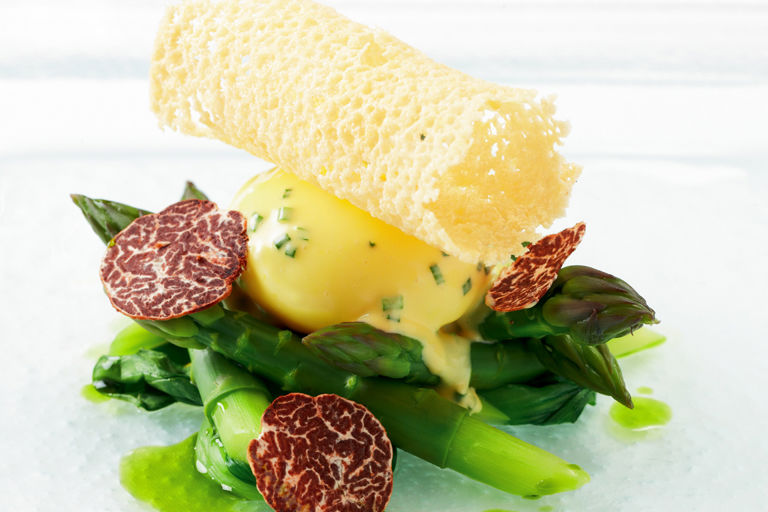 Asparagus spears with truffle, poached free-range duck egg and hollandaise sauce