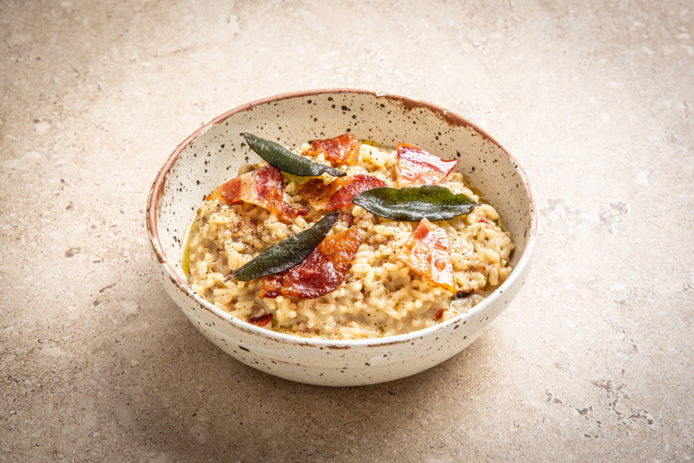 Mushroom risotto with crispy bacon and sage