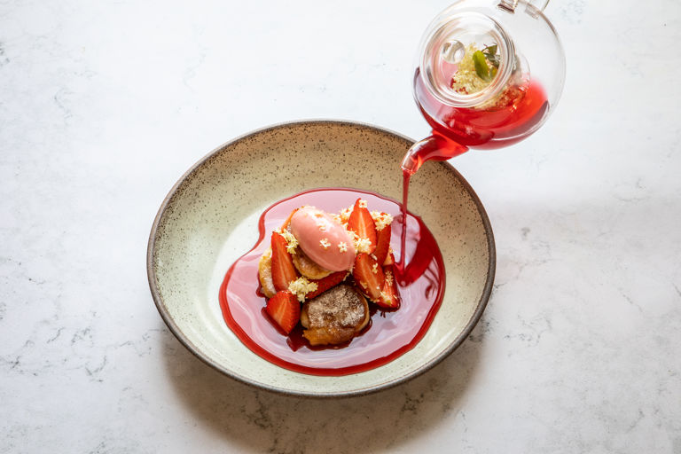 Kashubian 'ruchanki' drop scones, marinated strawberries, consommé, sorbet and elderflower