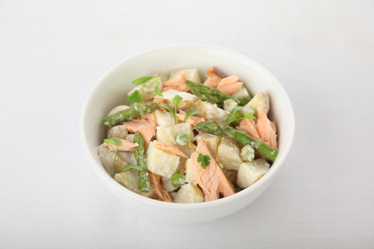 Hot smoked salmon potato salad with asparagus and horseradish dressing