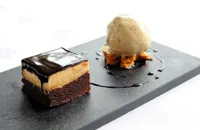 Chocolate and peanut mousse cake with gingerbread ice cream