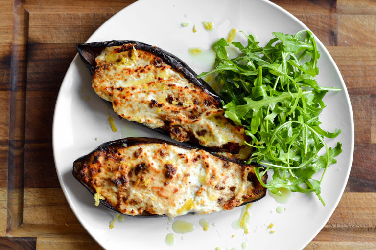 Aubergine stuffed with Quorn ragu, topped with Parmesan, ricotta and lemon zest