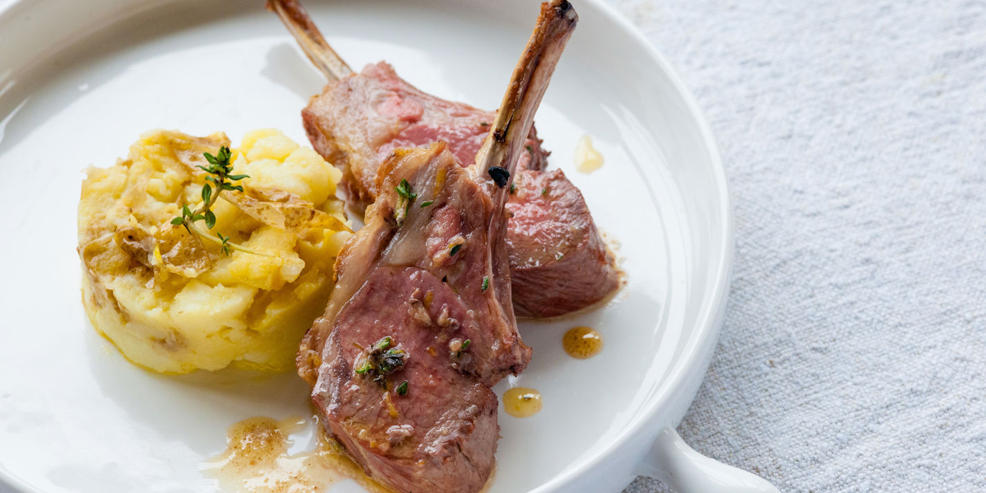 Grilled rack of lamb with crushed Jersey Royals and anchovy butter
