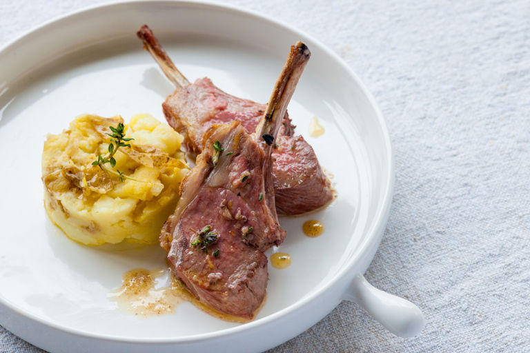 Grilled rack of lamb with crushed Jersey Royals and anchovy butter