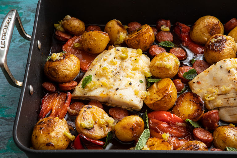 Roasted black cod with chorizo, potatoes, peppers and a pickled chilli dressing