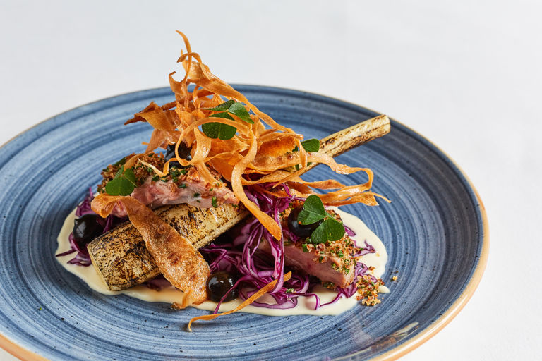 Roast partridge with red cabbage, parsnips and wood sorrel