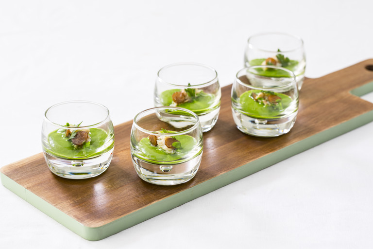 Crab and lovage soup with pickled kohlrabi