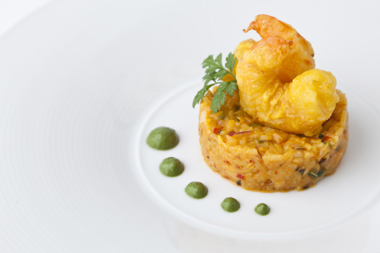 Crisp prawns and red onion-turmeric khichdi