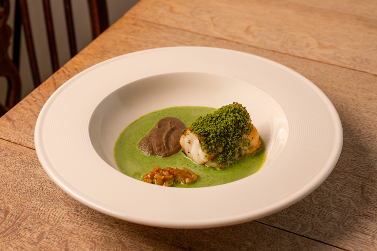 Pistachio monkfish with smoked aubergine purée, buttermilk dressing and lime pickle