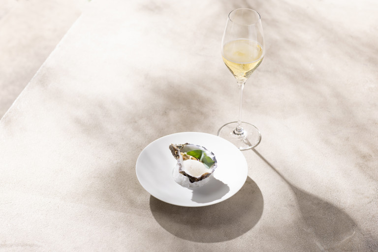 Marinated oyster with chilli, tamarind and peanut dressing