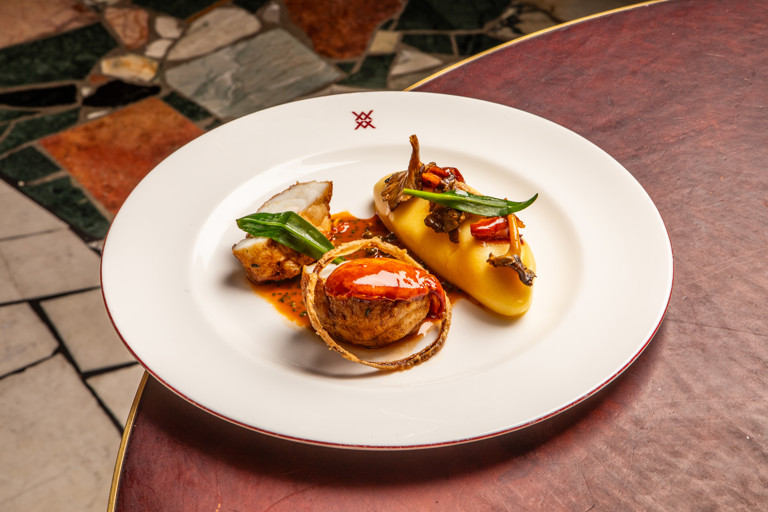 Cornish monkfish, mashed potato and lobster peppercorn sauce