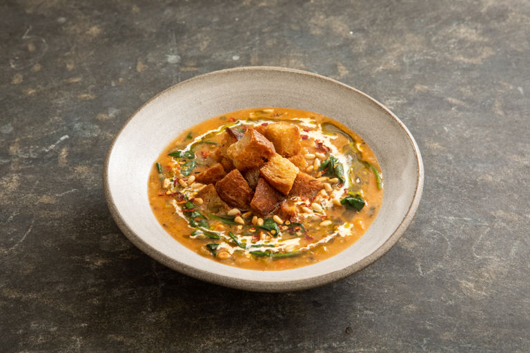 Tuscan cannellini bean soup with basil oil, toasted pine nuts and rosemary croutons