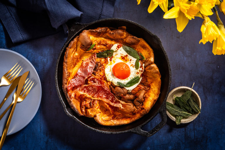 Dutch baby pancake with sage-fried eggs, crispy Parma ham and chilli brown butter