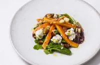 Papaya salad with goat's cheese and brazil nuts