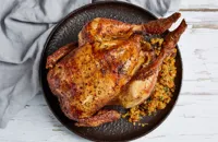 Rotisserie chicken with apricot, pine nut and freekeh stuffing