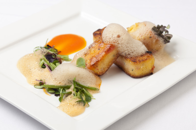Roasted red pepper polenta with red pepper purée, green beans and soy foam