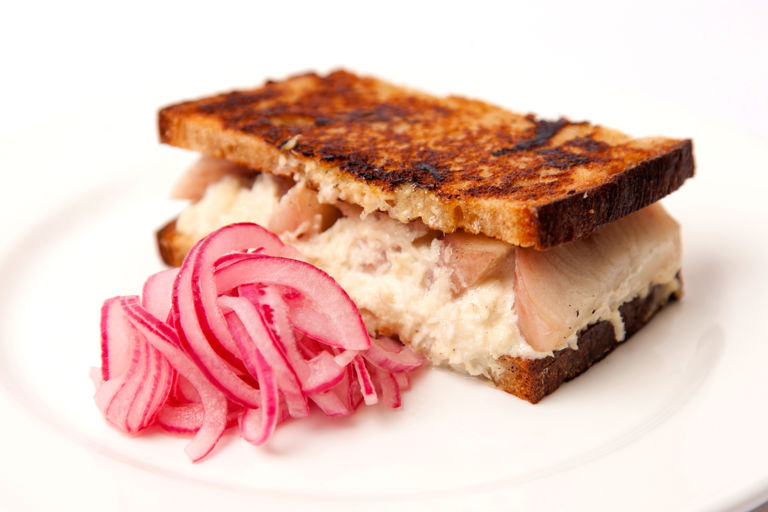 Smoked eel sandwich with onion pickle