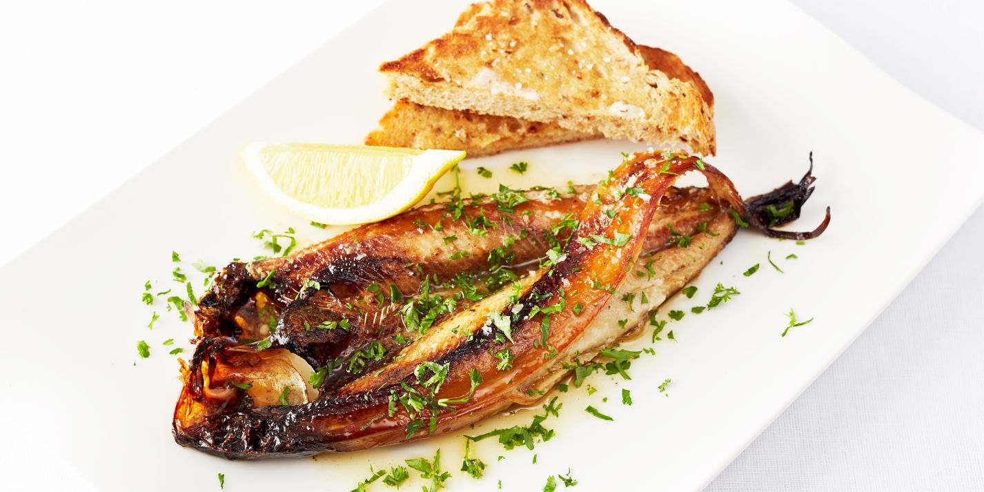 Grilled kippers, brown butter and parsley