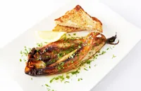 Grilled kippers, brown butter and parsley