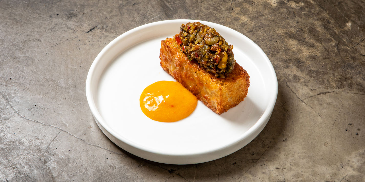 Ekuru with Pumpkin Seed Pestou and Scotch Bonnet Sauce - Great British Chefs-image