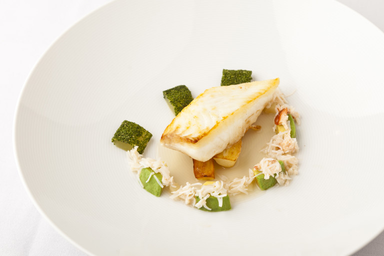 Pan-fried halibut, compressed cucumber, crab and lemongrass consommé 