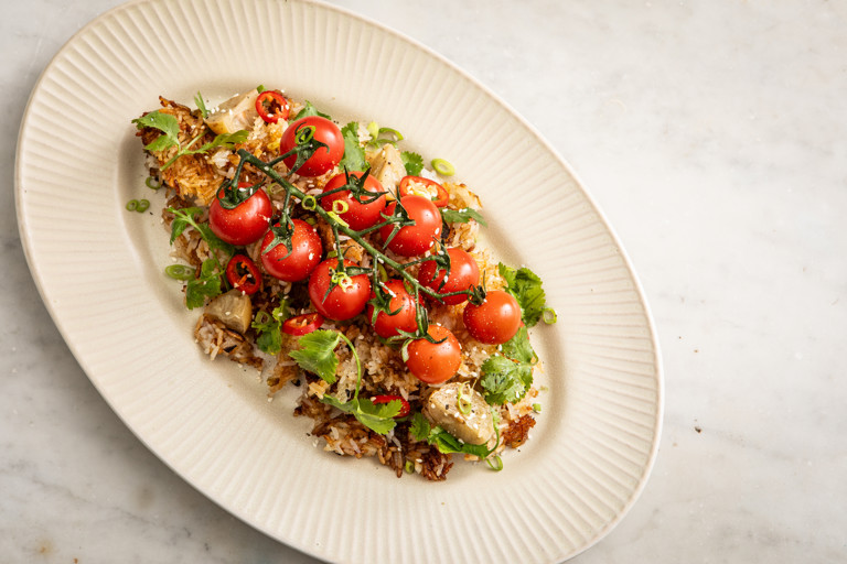 Preserved lemon, honey and chilli pickled tomatoes over crispy fried rice