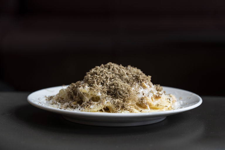 Celeriac salad with hazelnuts, truffle and Berkswell cheese