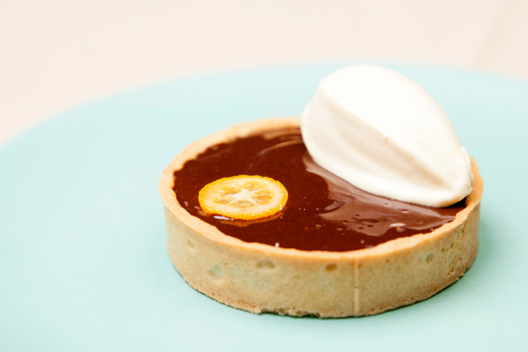 chocolate tart with kumquats and bergamot ice cream