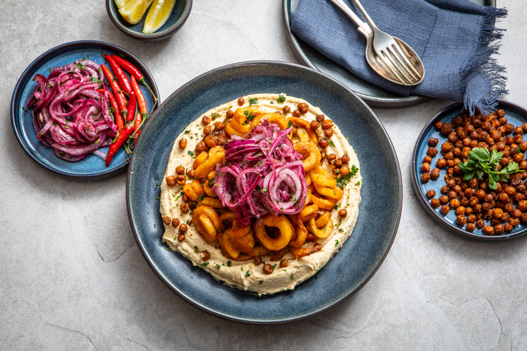 Chip, chickpea and onion hummus bowl