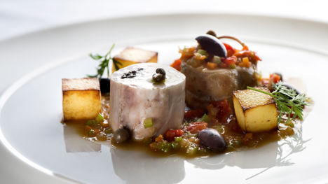 Rabbit, olives, capers, dried tomatoes, potatoes