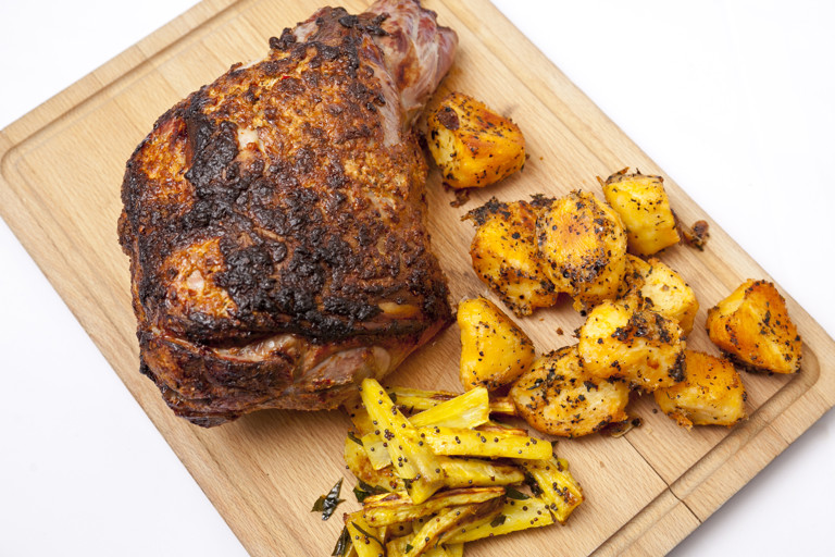 Roast leg of lamb 'aunty Soss's way' with spiced parsnips, carrots and crispy roast potatoes